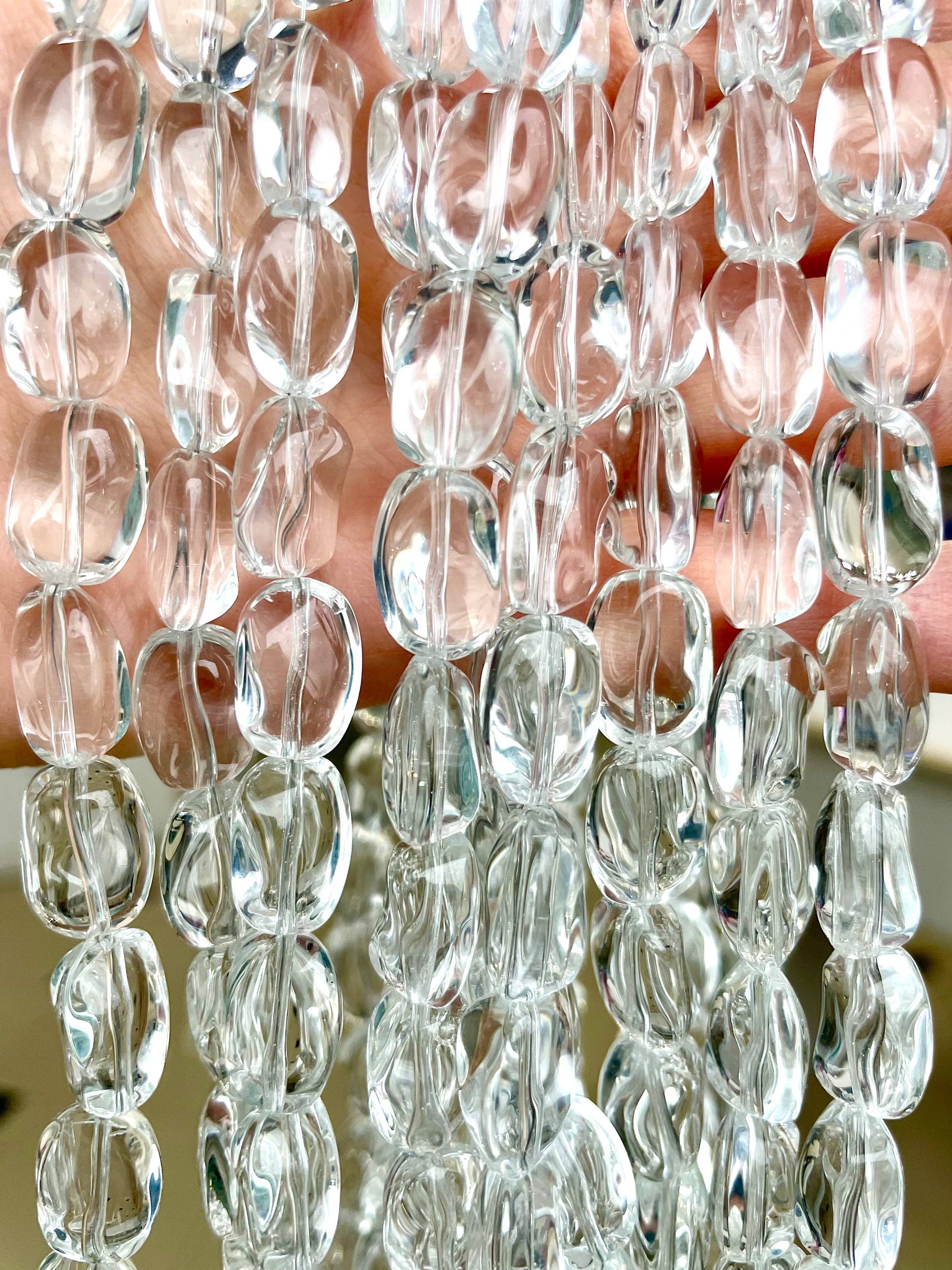 14728 Хрусталь (имит.) овал фриформ 14*10мм, прозрачный, нить 39см