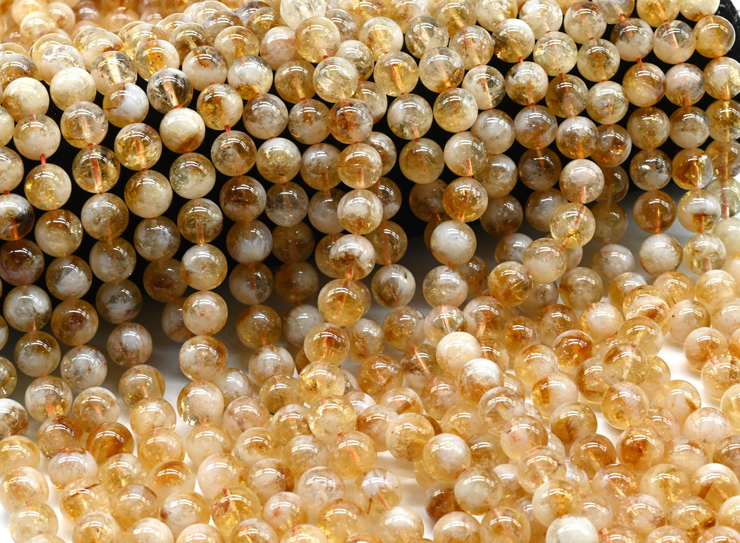 25029-10 Цитрин шар гладкий 10мм, нить 19см